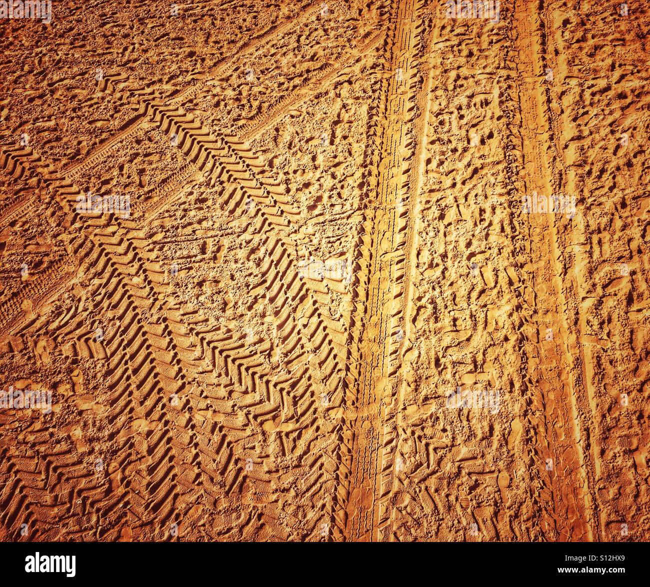 Tyre tracks in the sand - Smartphone Captured Stock Image