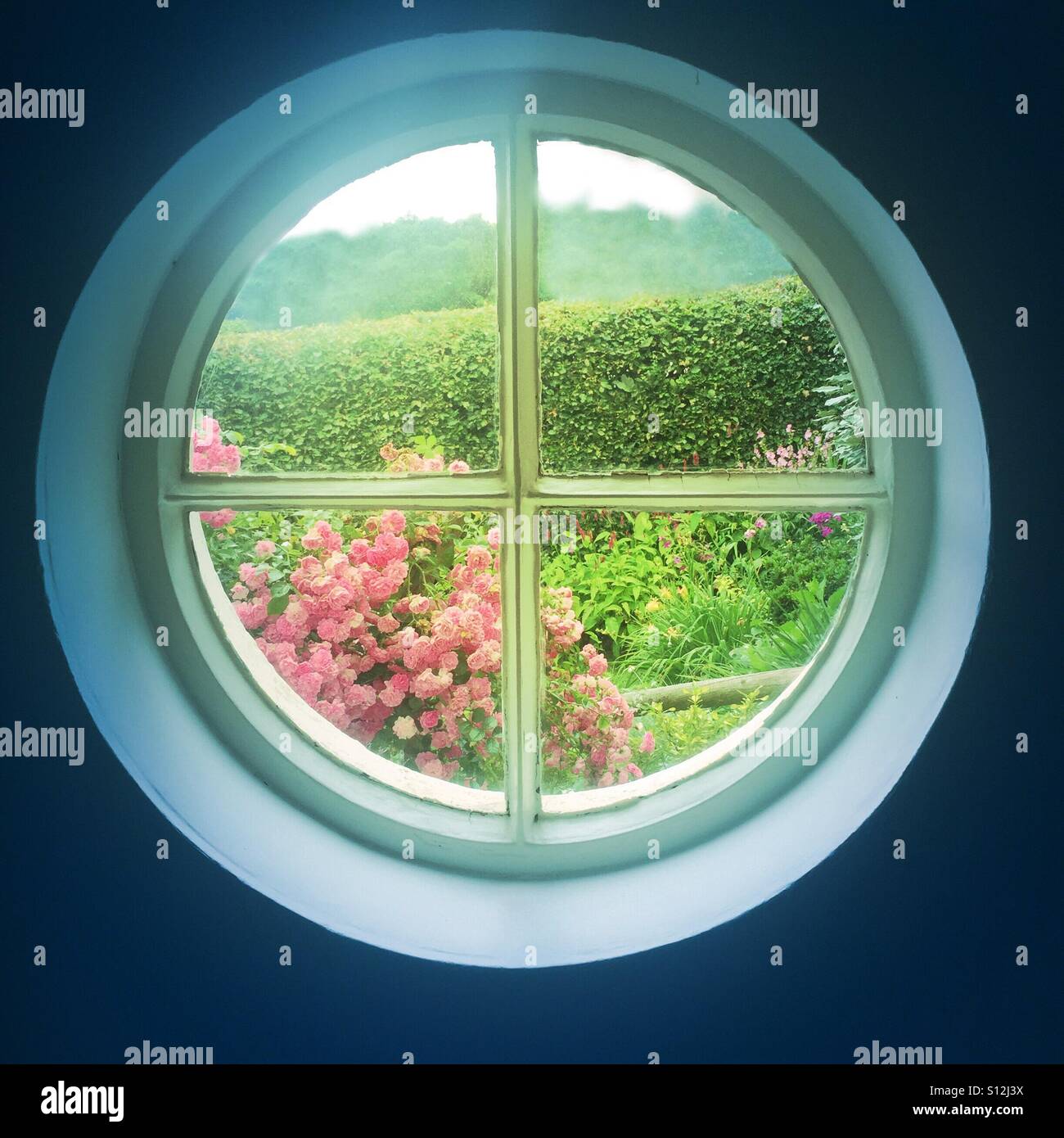 Through the round window Stock Photo