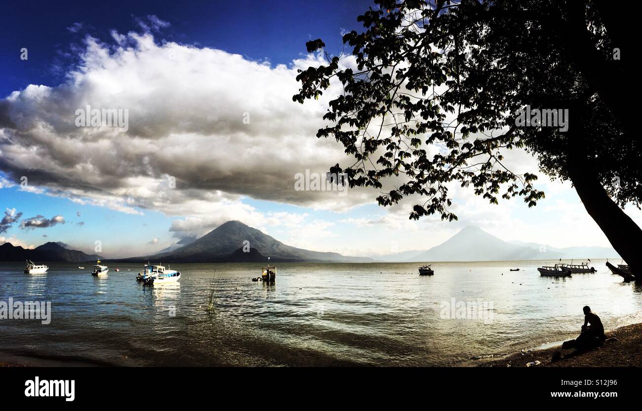 Volcanoes at sunset, Lake Atitlan, Guatemala - Smartphone Captured Stock Image