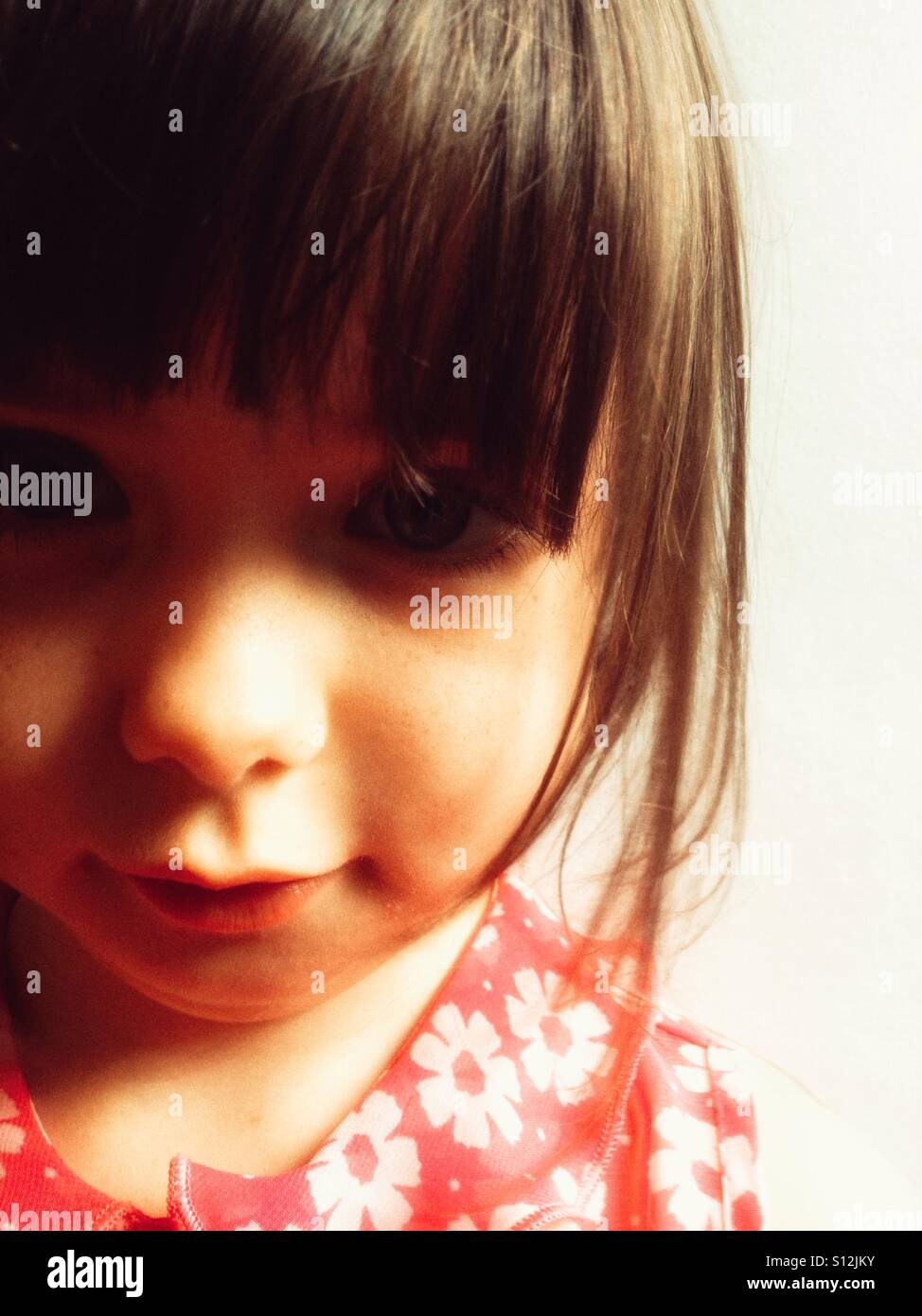 4-year old child in summer flowery dress - Smartphone Captured Stock Image