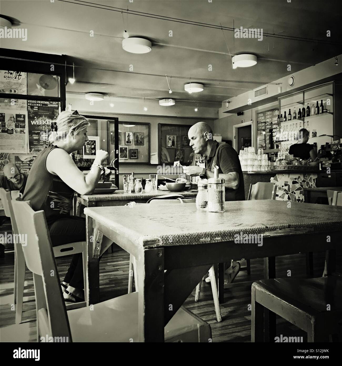 People having lunch in a restaurant in Helsinki - Smartphone Captured Stock Image