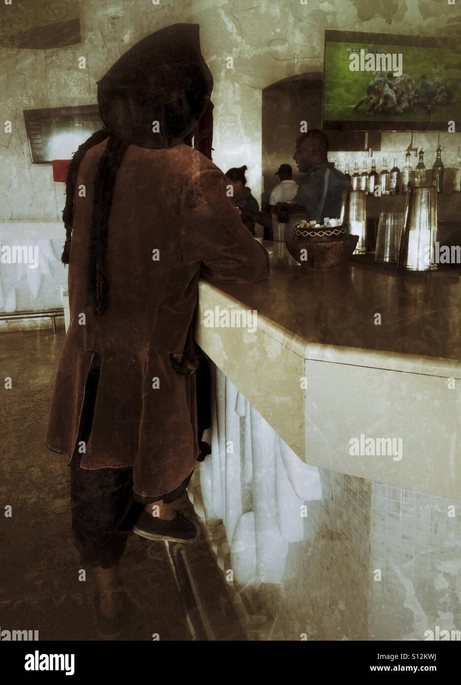 ...and then the pirate sidled up to the bar to watch the game. - Smartphone Captured Stock Image