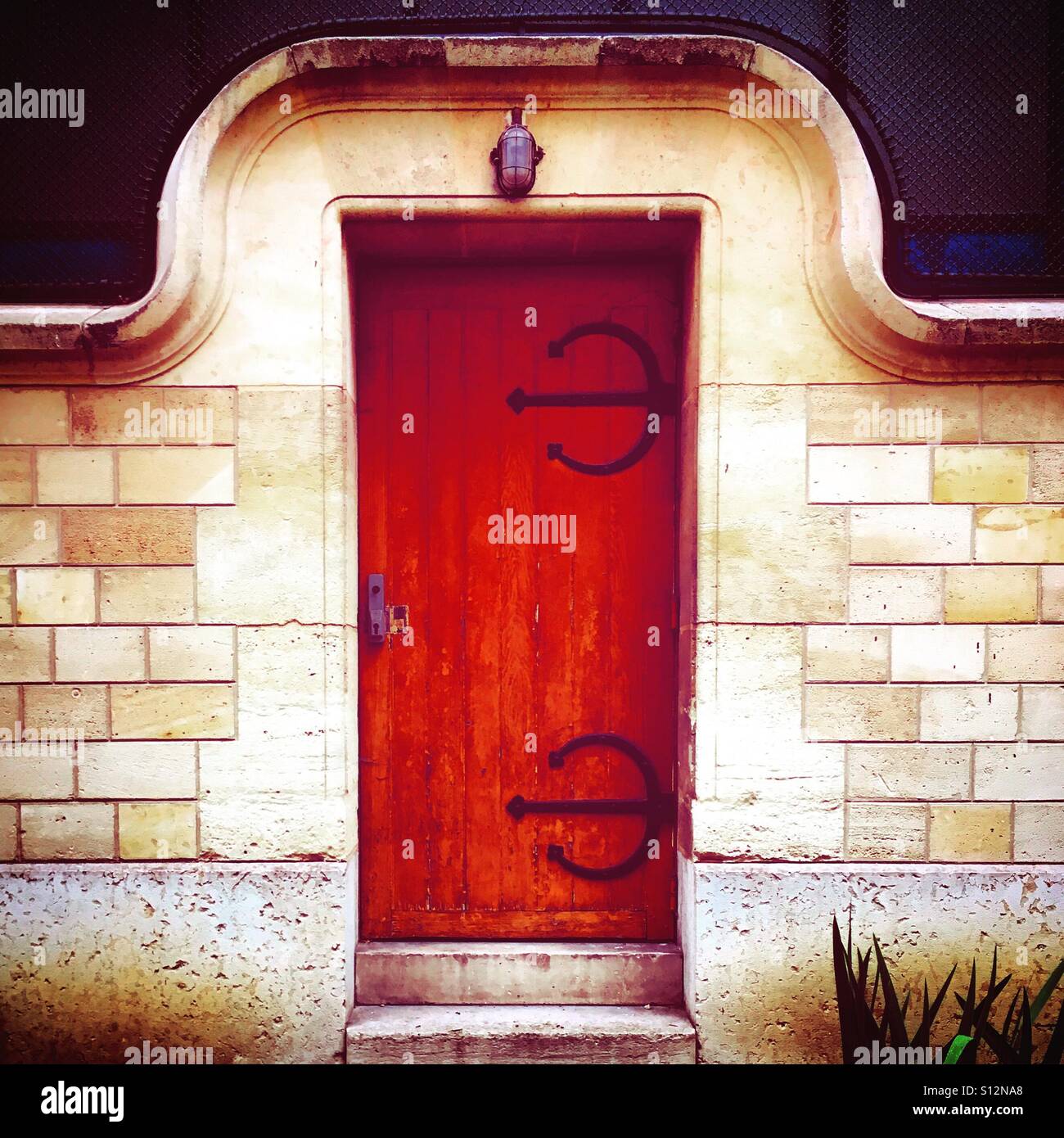Wood door of a church in Paris - Smartphone Captured Stock Image