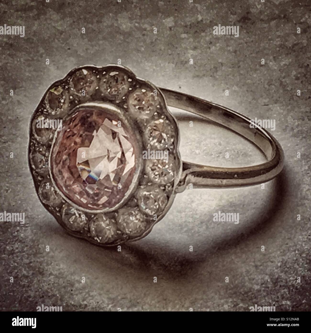 Pink sapphire and diamond ring. Stock Photo