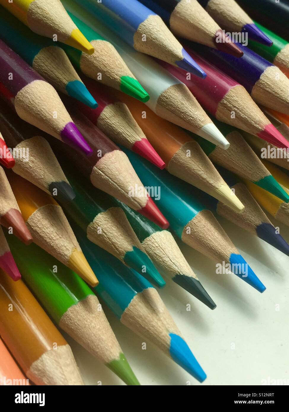 Colored pencils on a white background - Smartphone Captured Stock Image