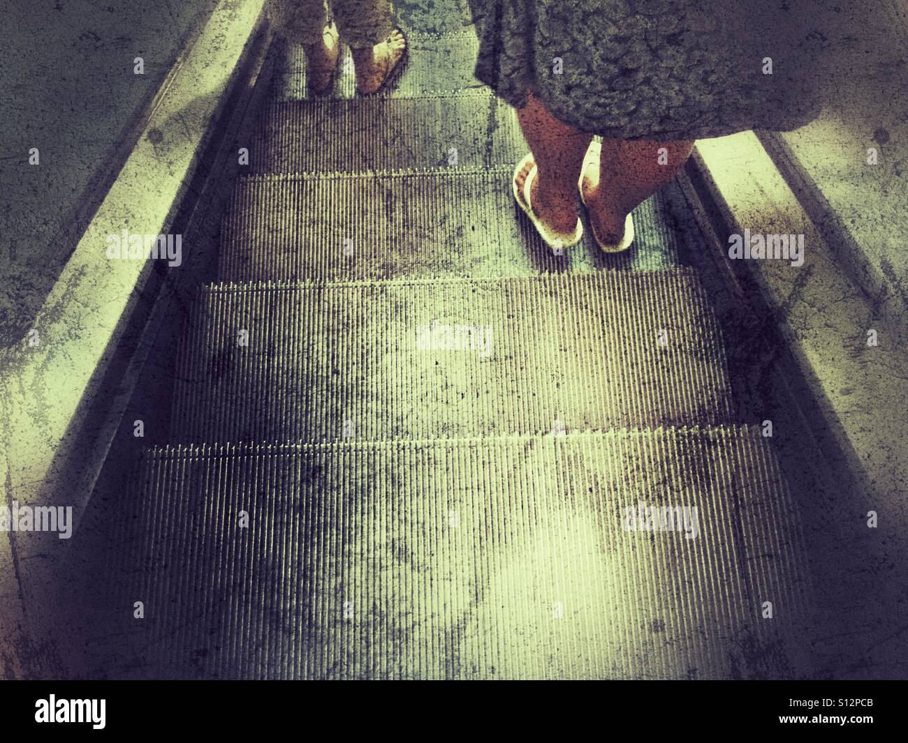 Escalator, going down - Smartphone Captured Stock Image