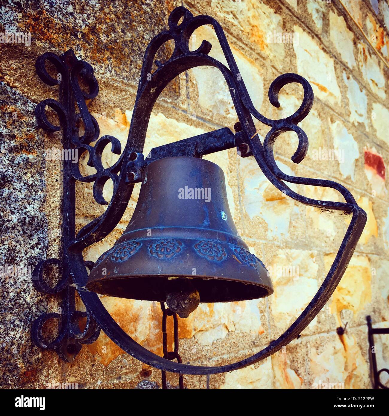 Old style door bell at a house in Normandy - Smartphone Captured Stock Image