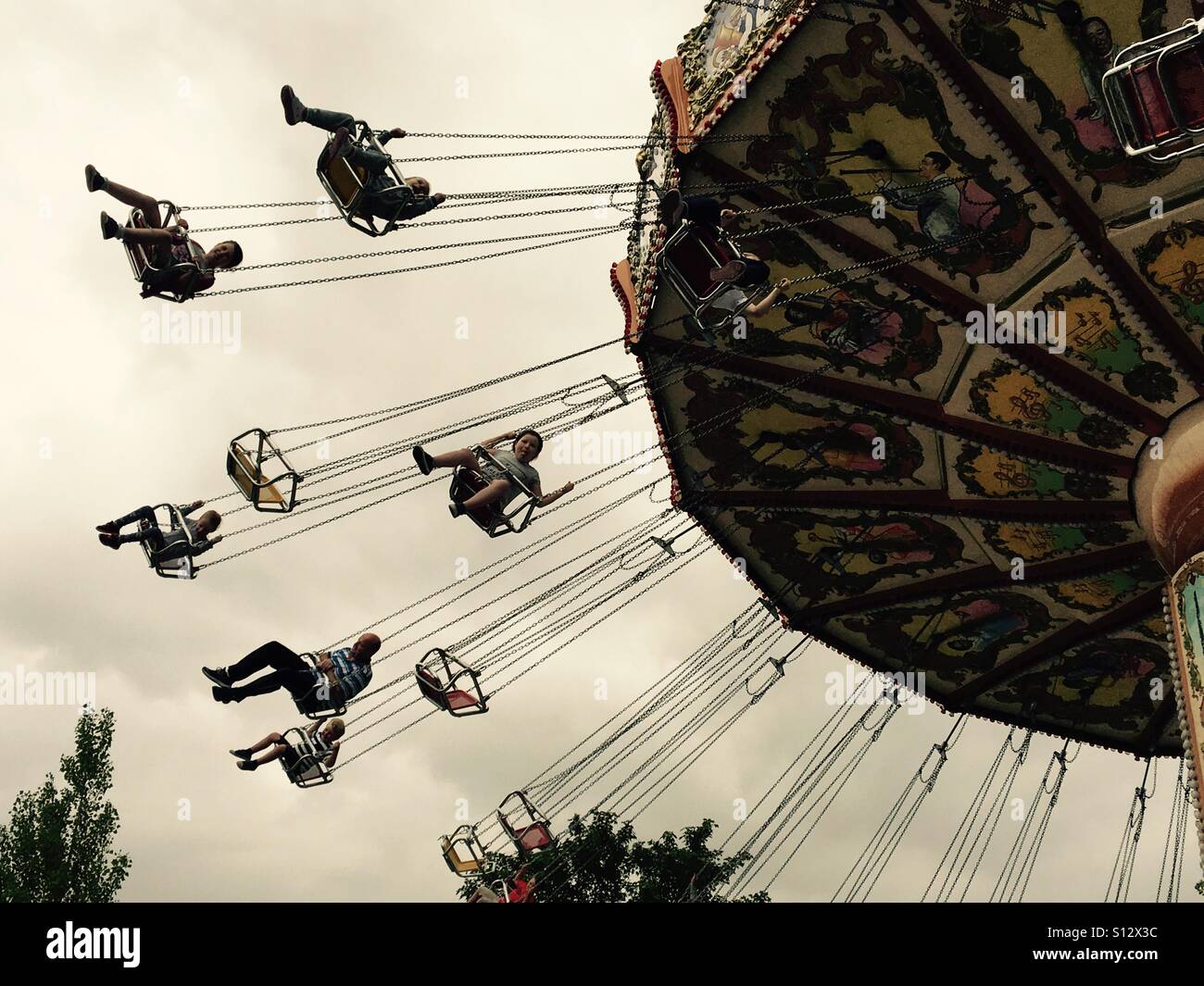 Swings flying through the sky Stock Photo