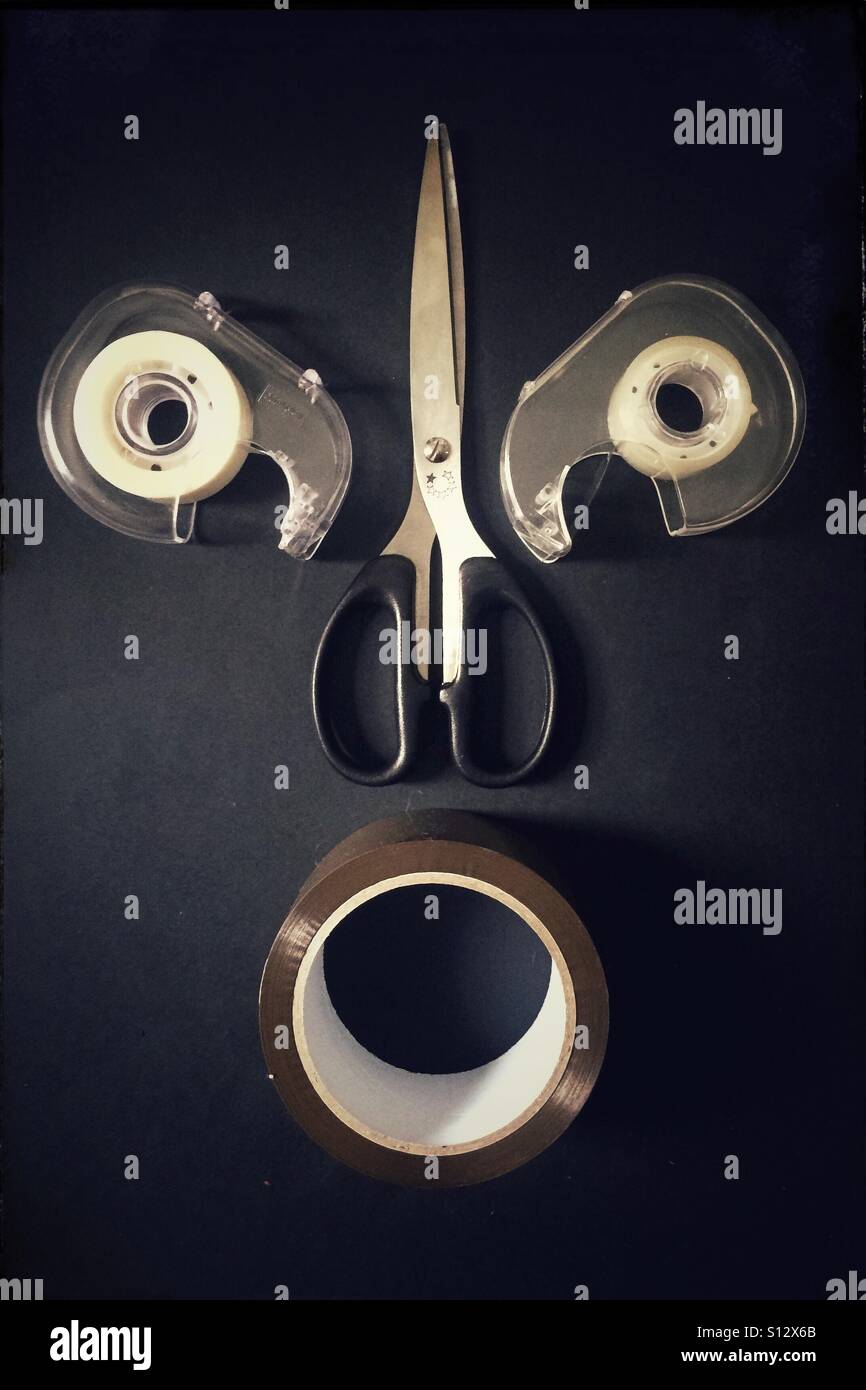 Face made of tape and scissors - Smartphone Captured Stock Image