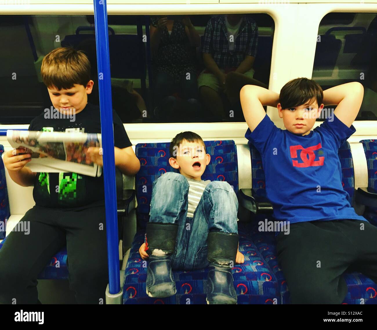 Boys on tube hi-res stock photography and images - Alamy