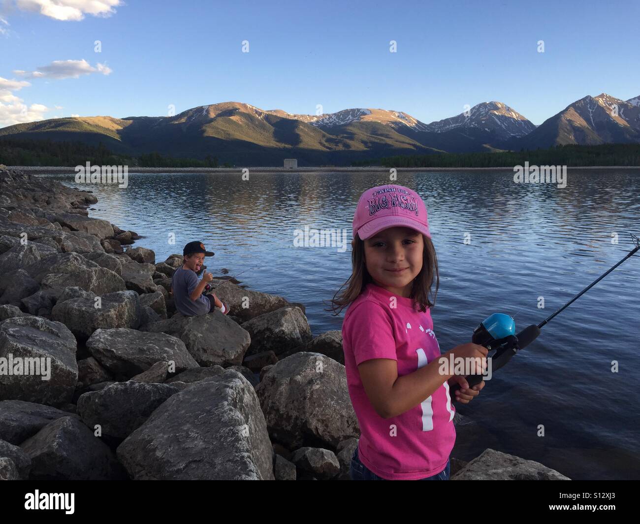 Siblings fishing hi-res stock photography and images - Alamy