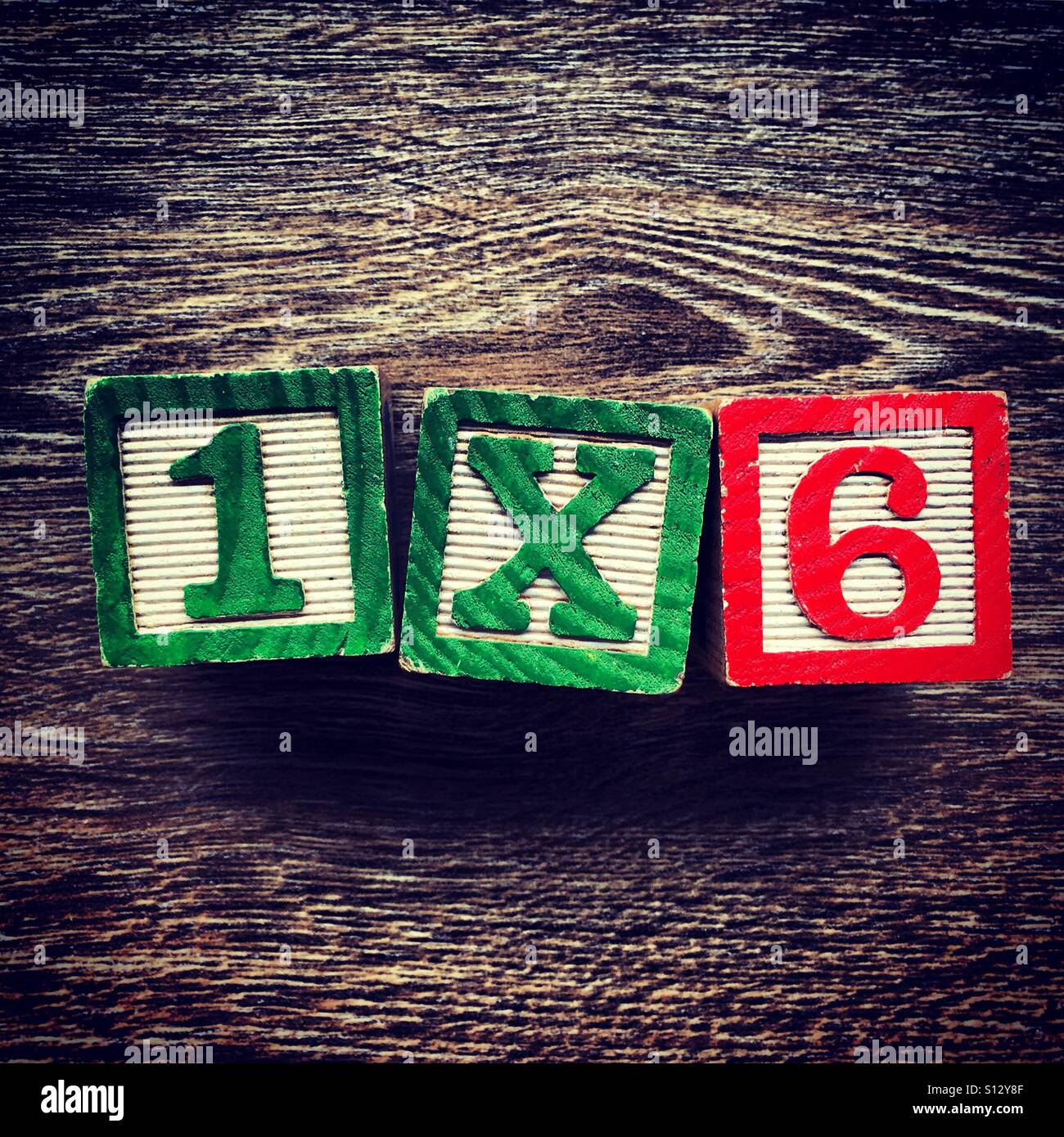 1x6 numbers written with wood block letter toys - Smartphone Captured Stock Image