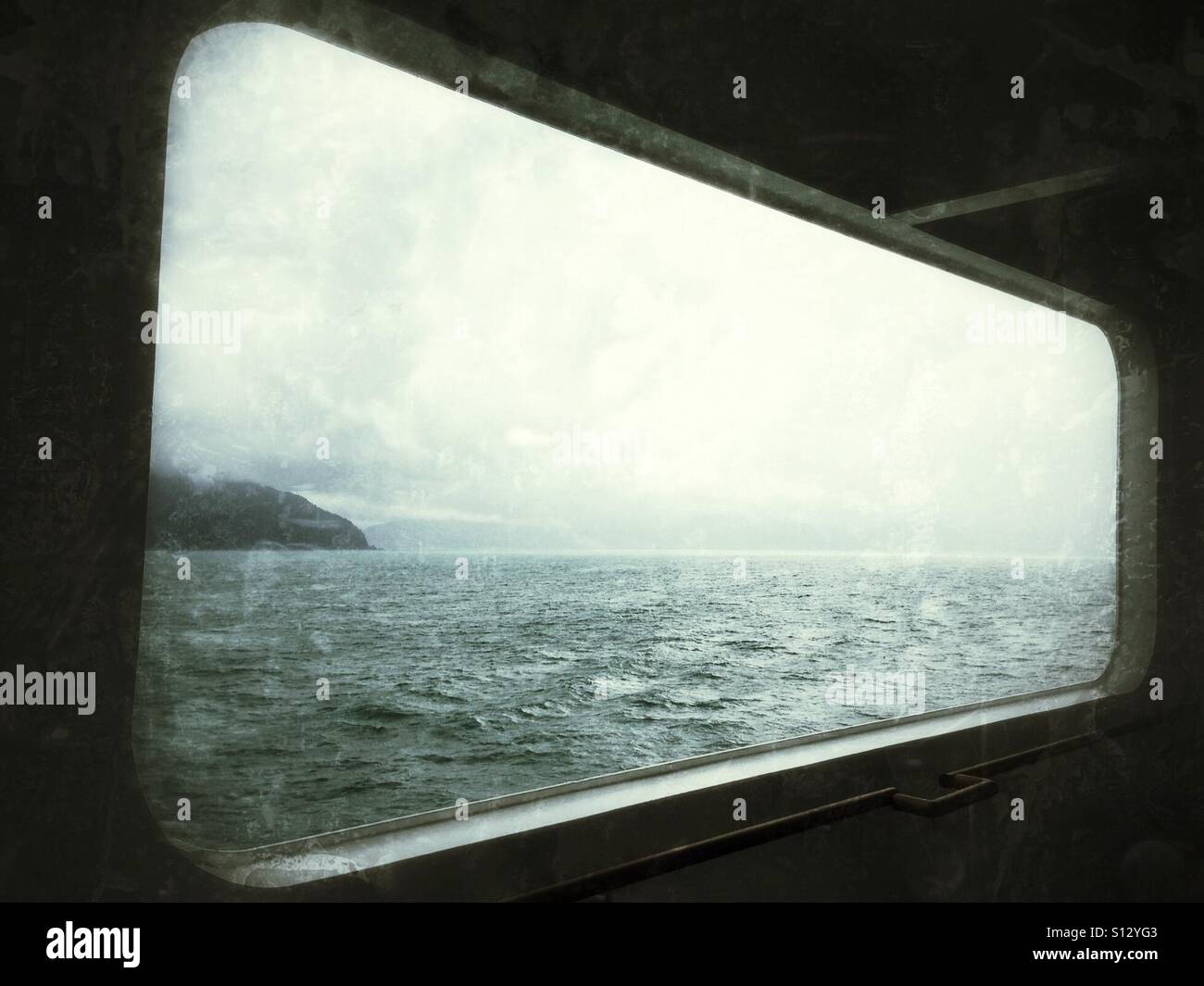 A blustery day off the coast of Alaska viewed from a large ship. - Smartphone Captured Stock Image