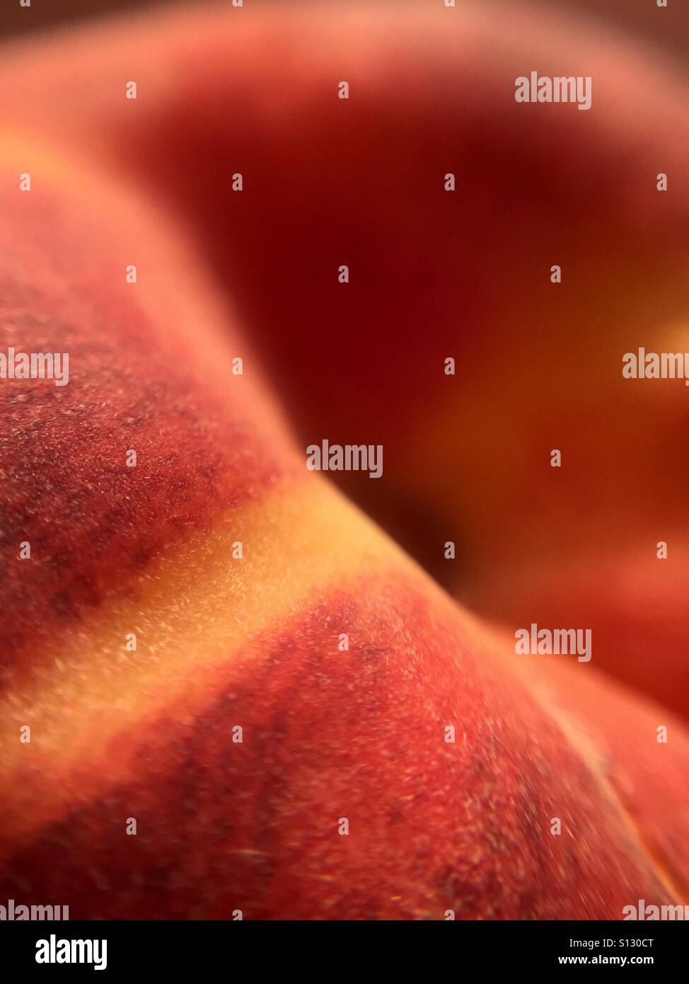 Close up of a fuzzy peach - Smartphone Captured Stock Image