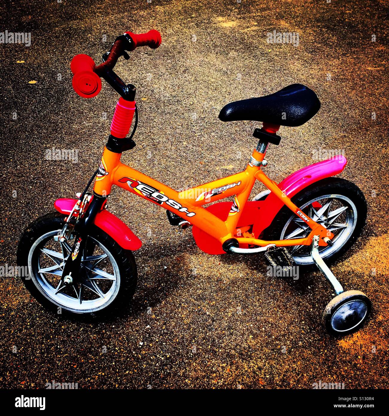 Orange Kid's bike - Smartphone Captured Stock Image