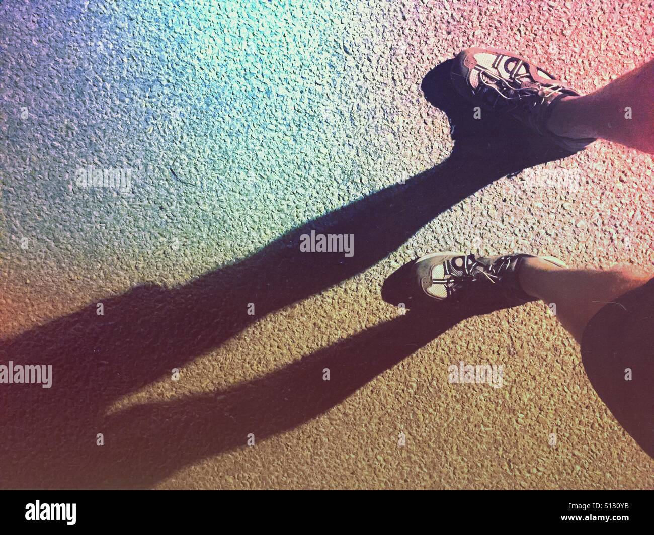 Shadow of a man doing an evening walk - Smartphone Captured Stock Image