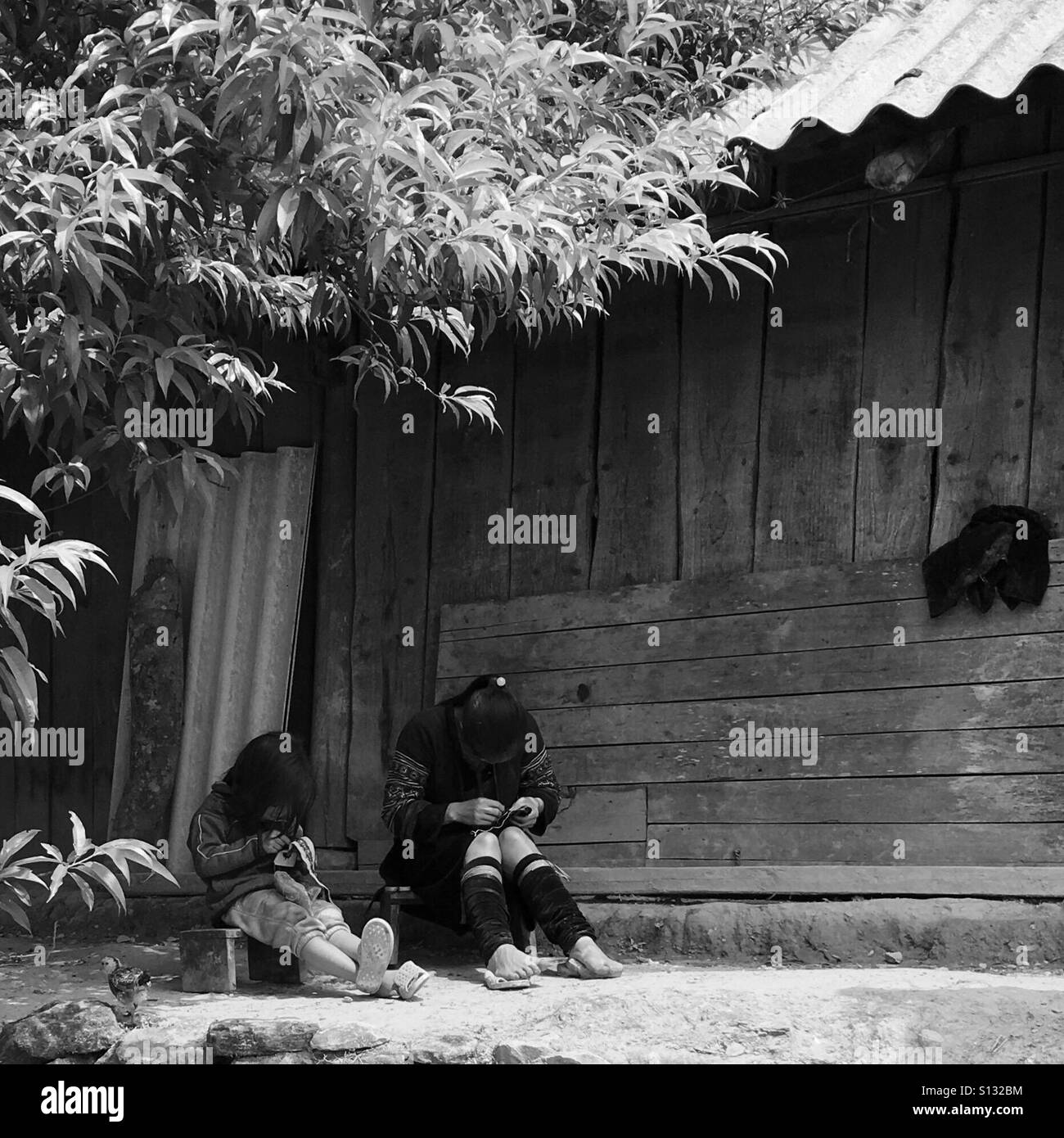 Girls working on handicraft near Sapa Vietnam Stock Photo