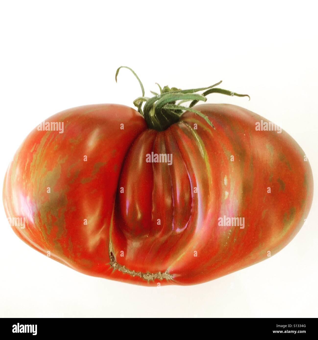 Berkeley Tie-dye Heart tomato, oddball heirloom Stock Photo