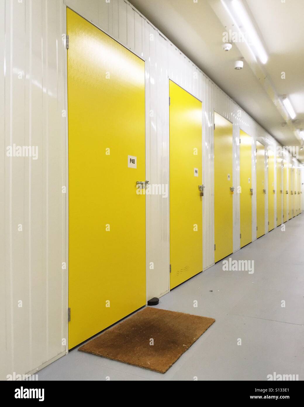 Doormat outside storage unit Stock Photo Alamy