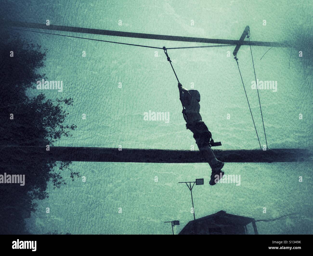 Boy fell from a sky walk hanged from rope - Smartphone Captured Stock Image