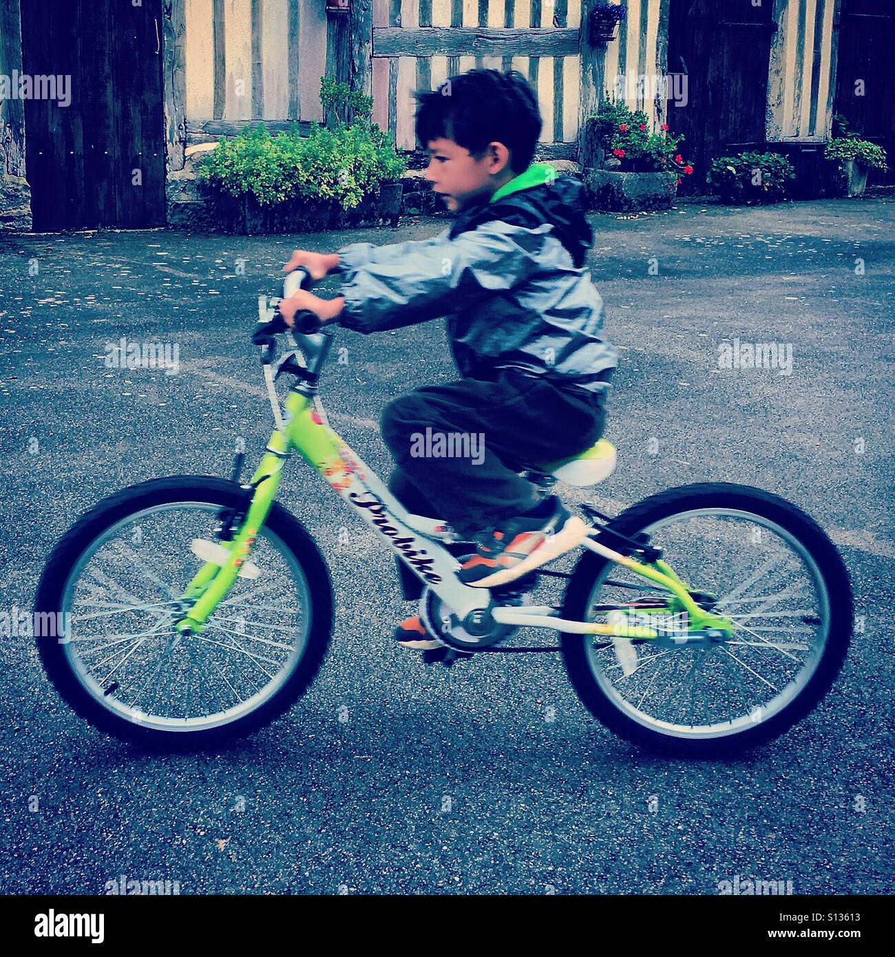 Boy on bike Stock Photo