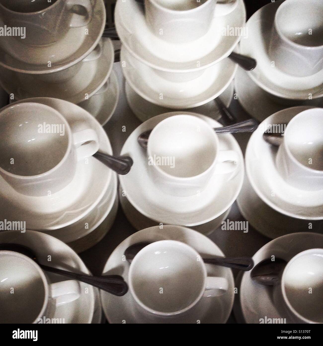 Empty cups and saucers ready. Mobile phone photo with some phone or tablet post processing. - Smartphone Captured Stock Image