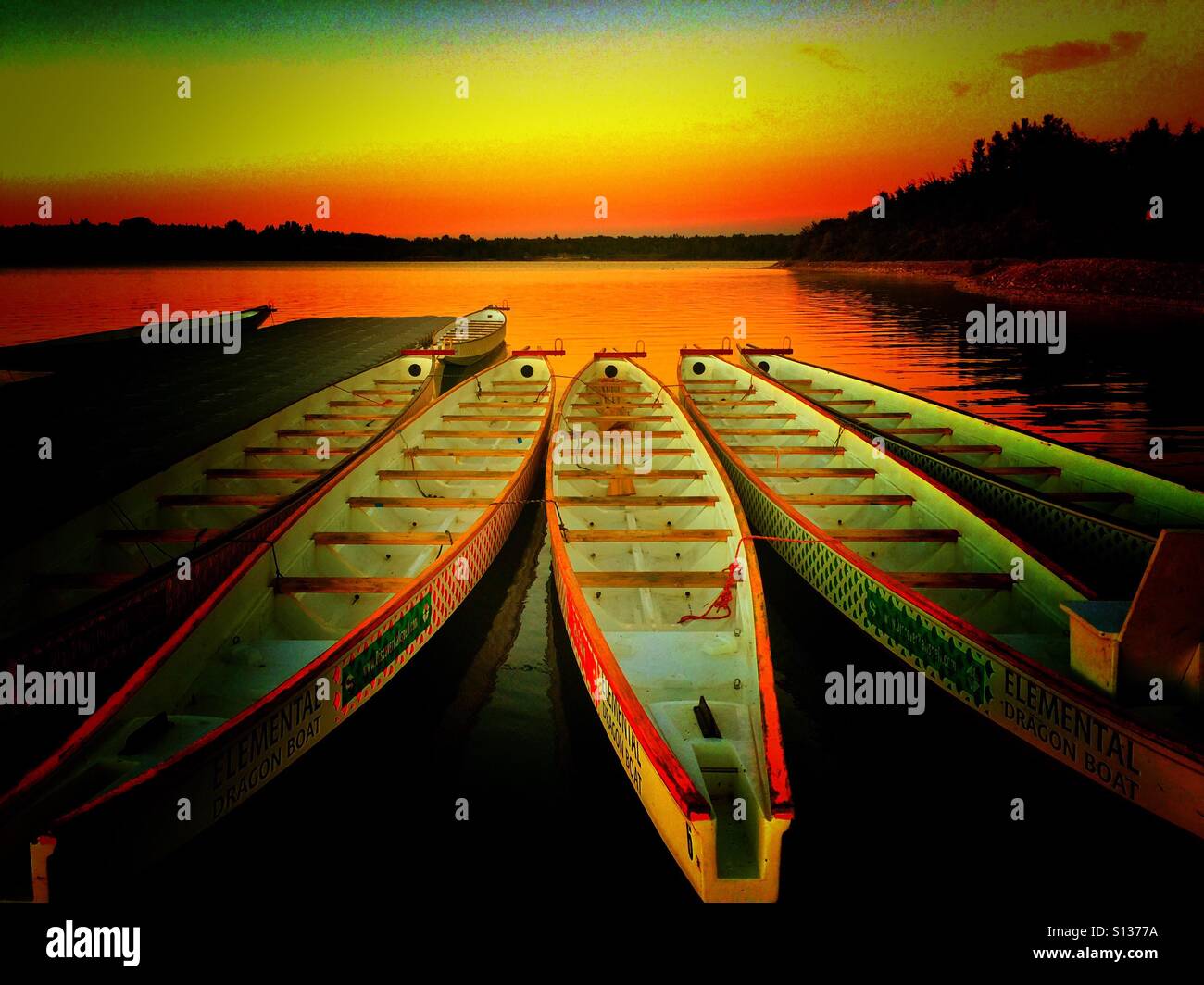 Dragon boats at Glenmore reservoir, Calgary, Alberta, Canada - Smartphone Captured Stock Image