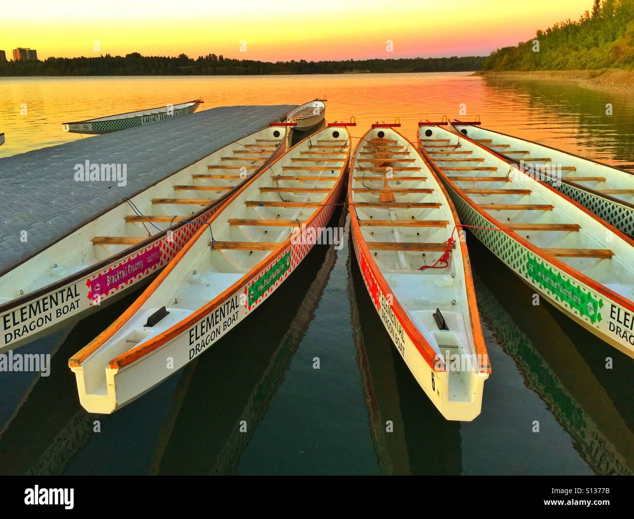 Dragon boats at Glenmore reservoir, Calgary, Alberta, Canada - Smartphone Captured Stock Image