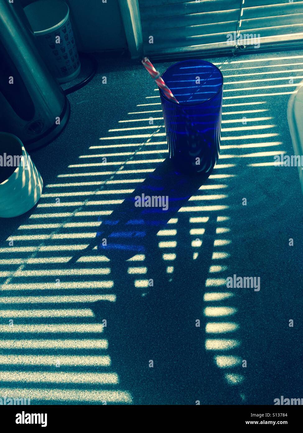 Reaching for a glass - Smartphone Captured Stock Image