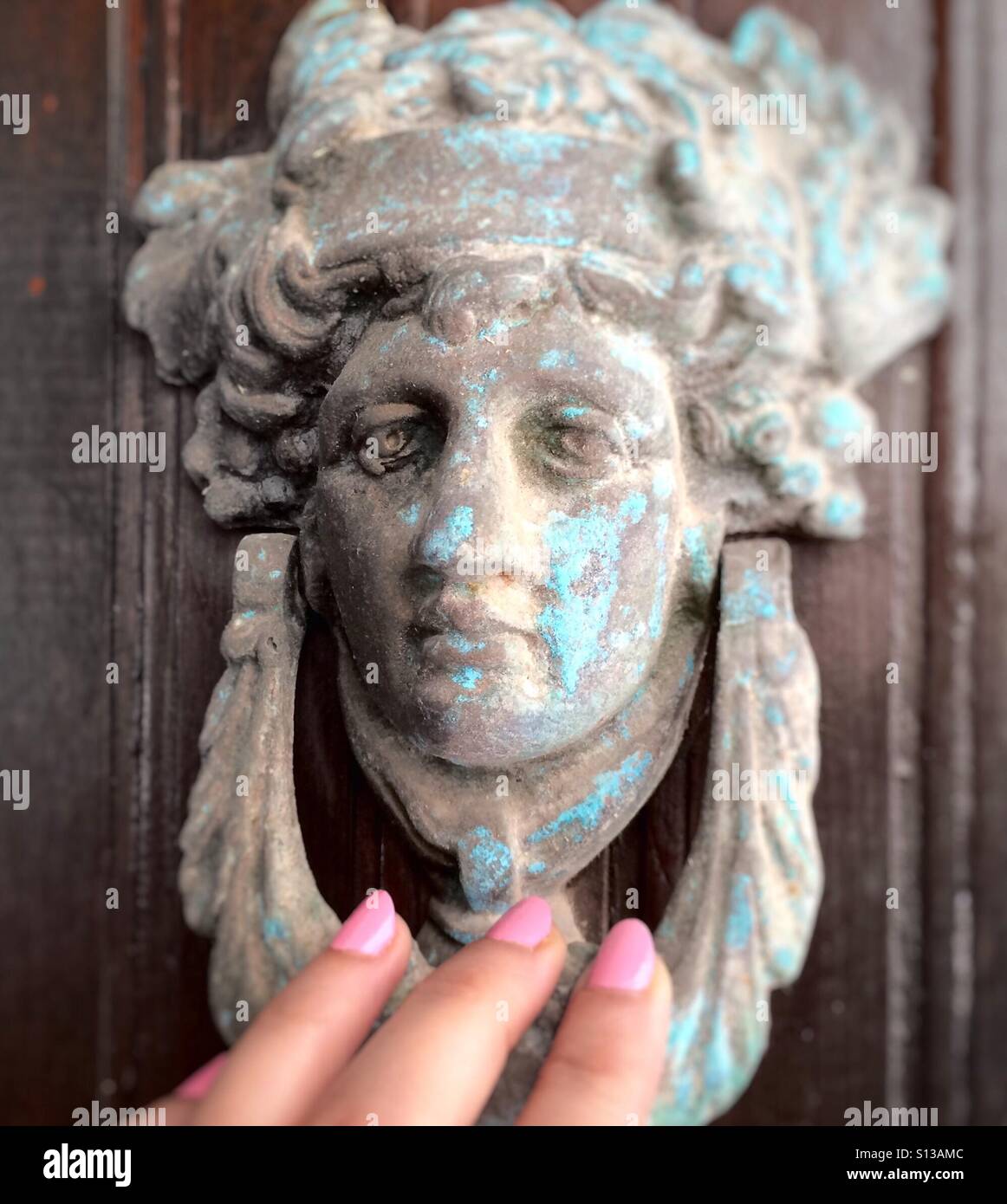 A traditional Greek door knocker Stock Photo Alamy