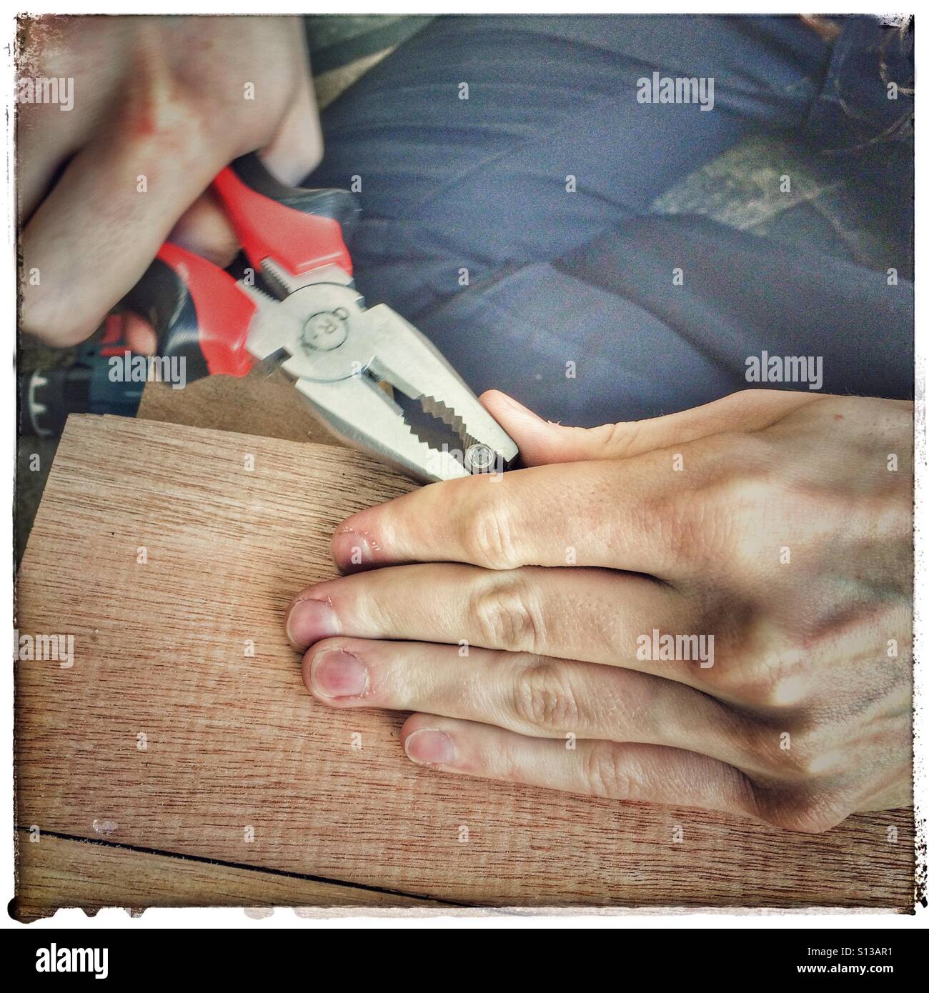 Working on DIY project. - Smartphone Captured Stock Image