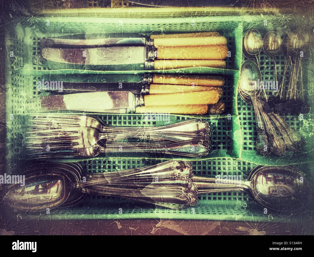 Silver cutlery in a cutlery drawer. - Smartphone Captured Stock Image