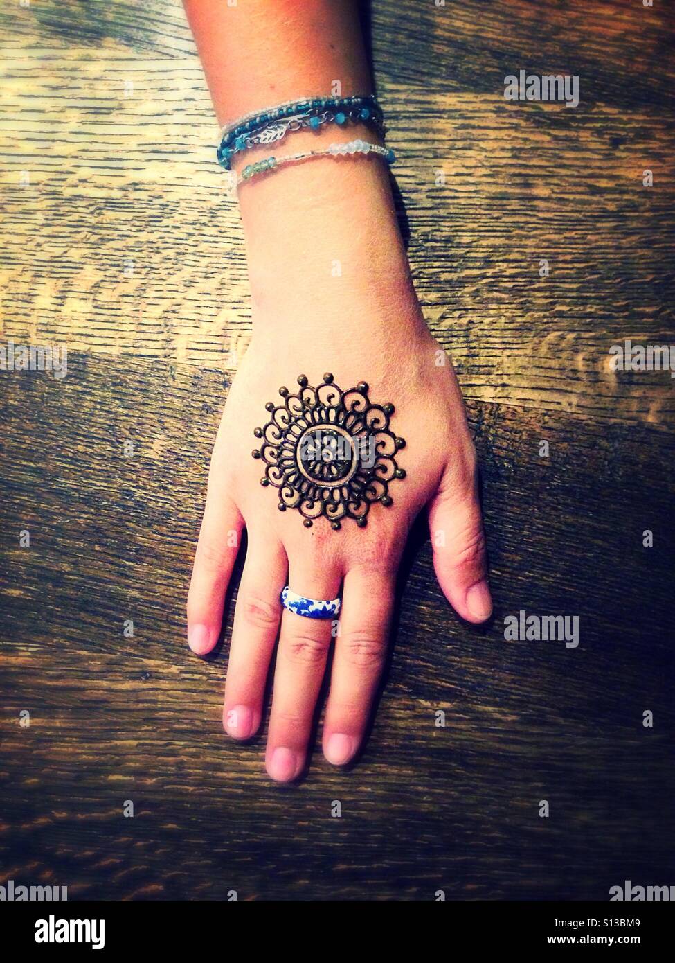 Mehendi on the hand - Smartphone Captured Stock Image