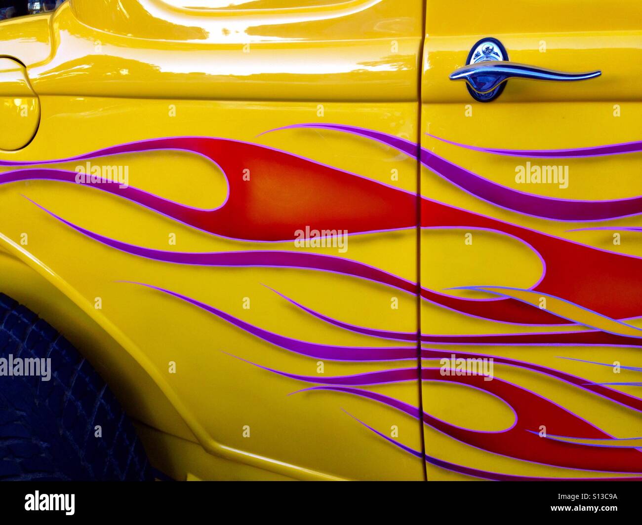 Side door of yellow custom car - Smartphone Captured Stock Image