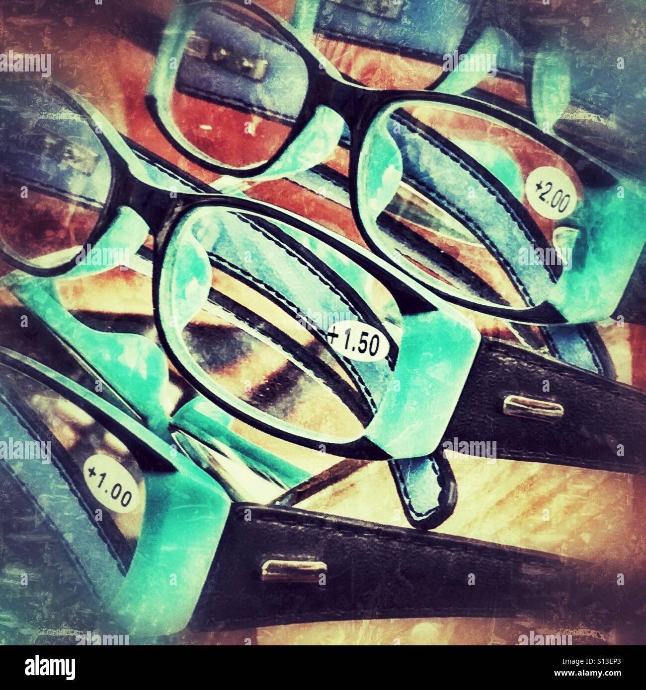 Prescription glasses displayed on a market stall - Smartphone Captured Stock Image