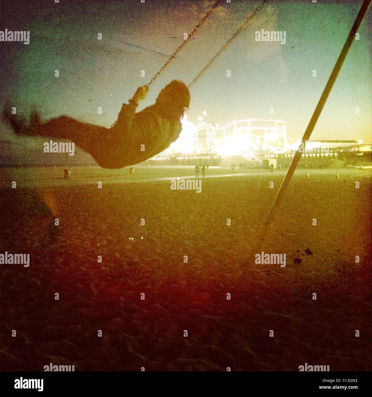 Swinging action shot Stock Photo Alamy