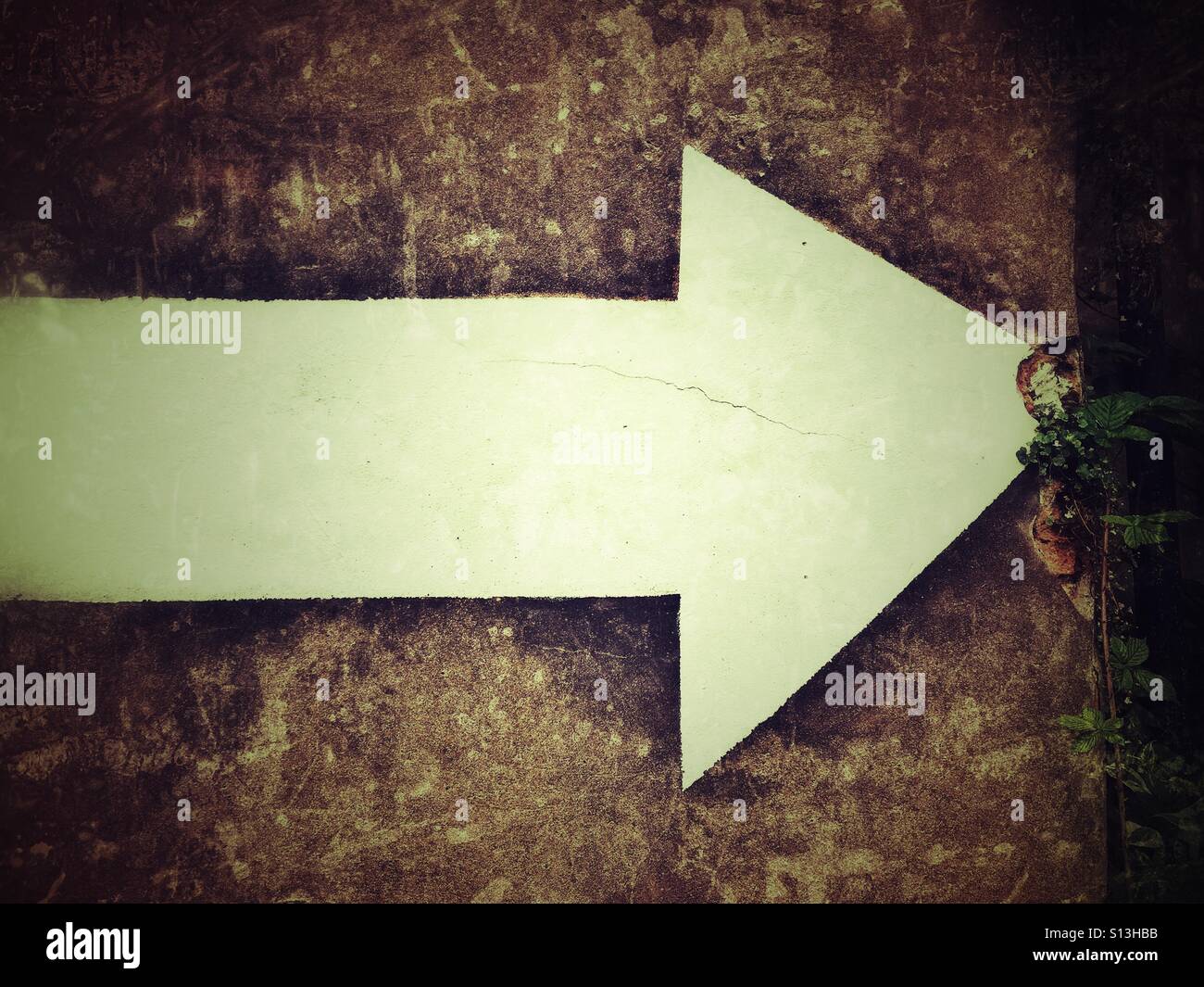 Arrow on wall - Smartphone Captured Stock Image