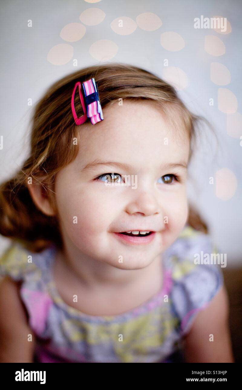 Girl smiling with sparkly eyes Stock Photo