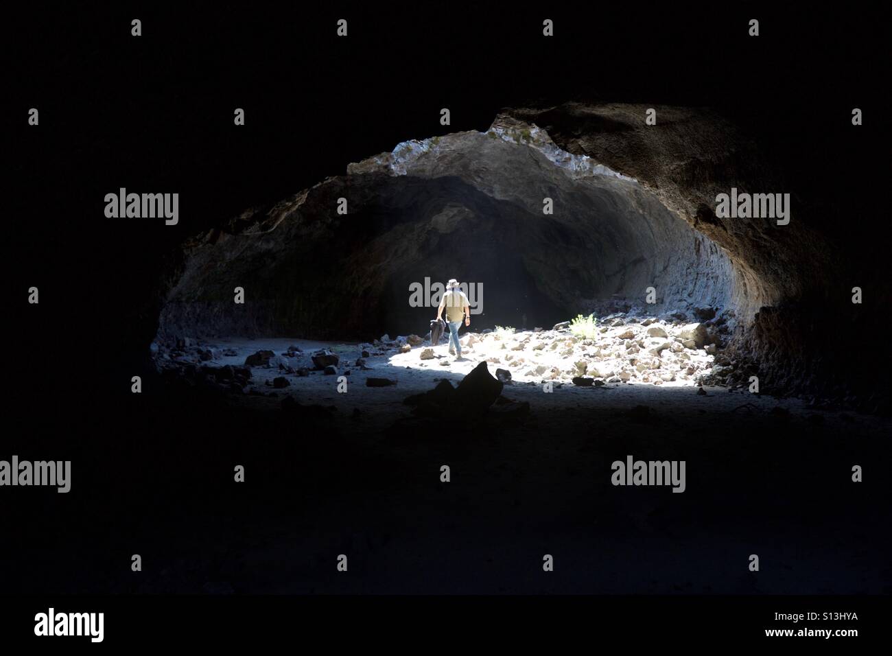 Cave exploring adventure in an Oregon lava tube. - Smartphone Captured Stock Image