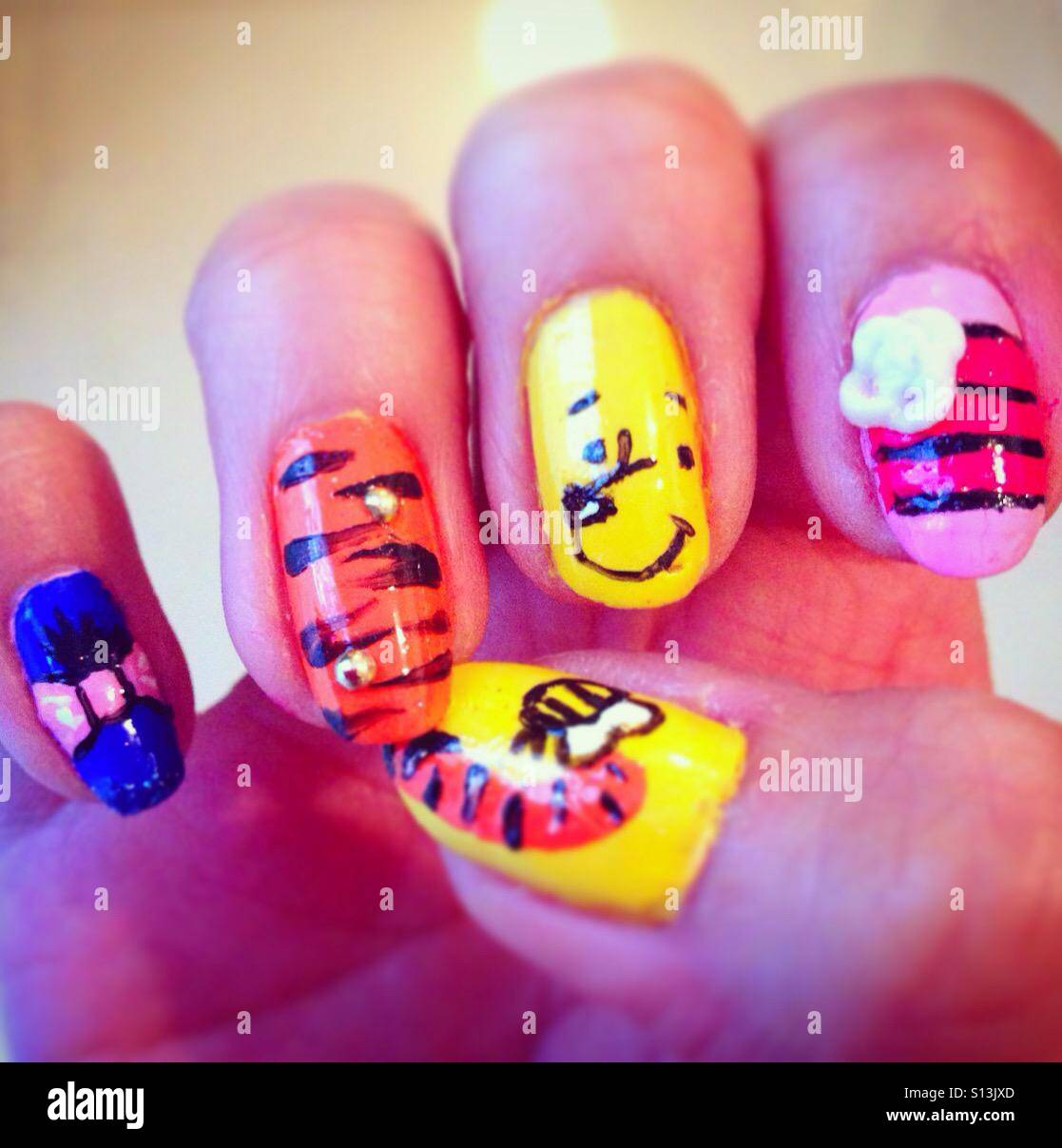 Winnie the Pooh nail art Stock Photo - Alamy