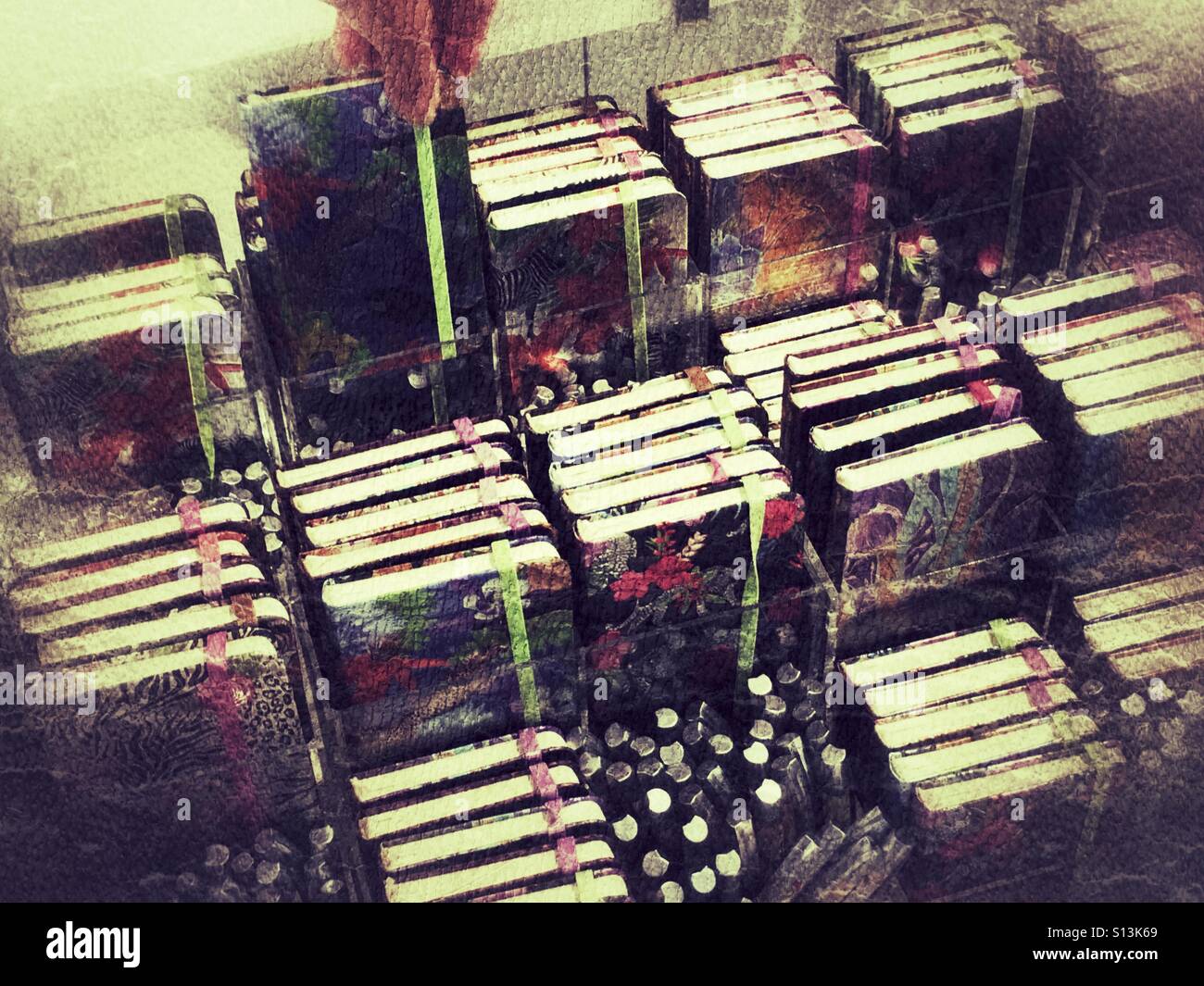 Choosing a notebook from a display in a shop . - Smartphone Captured Stock Image