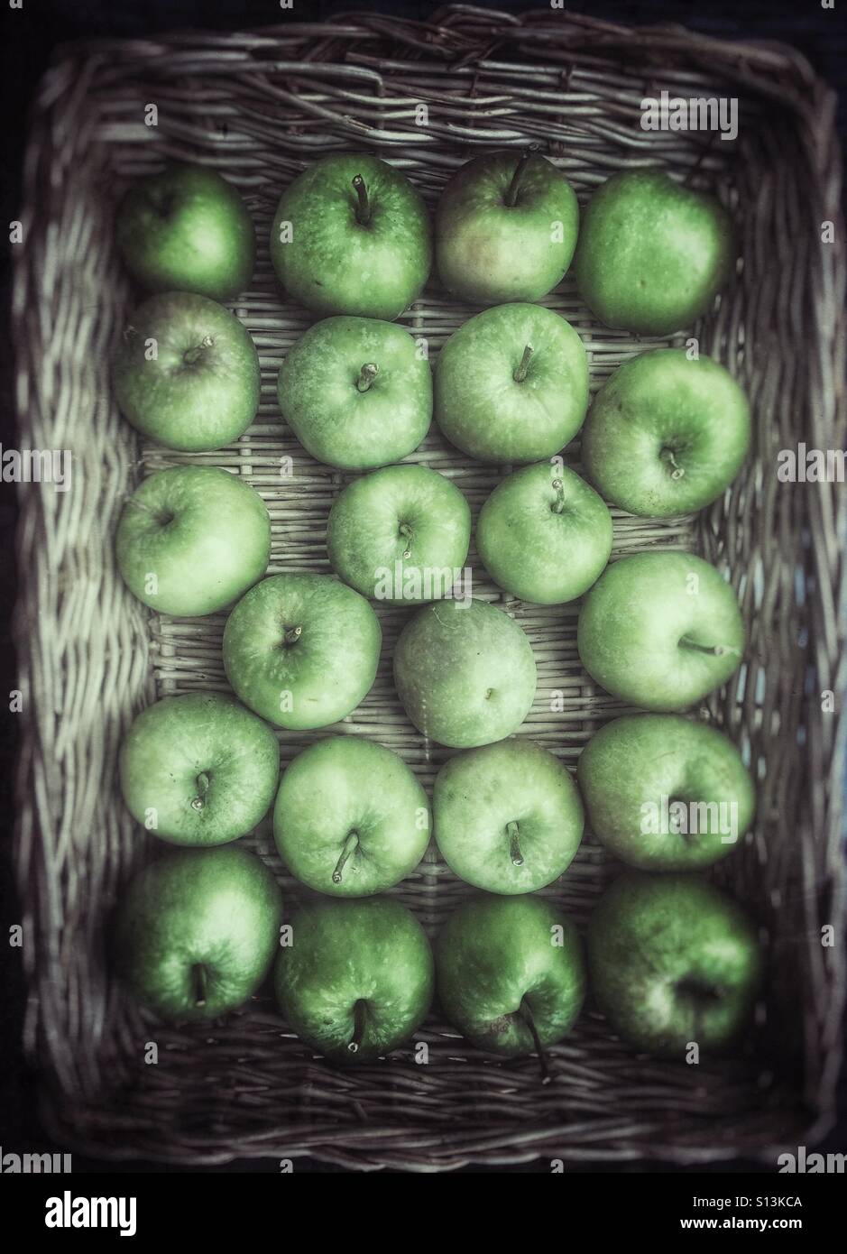 22 Home grown green apples in a wicker basket Stock Photo - Alamy