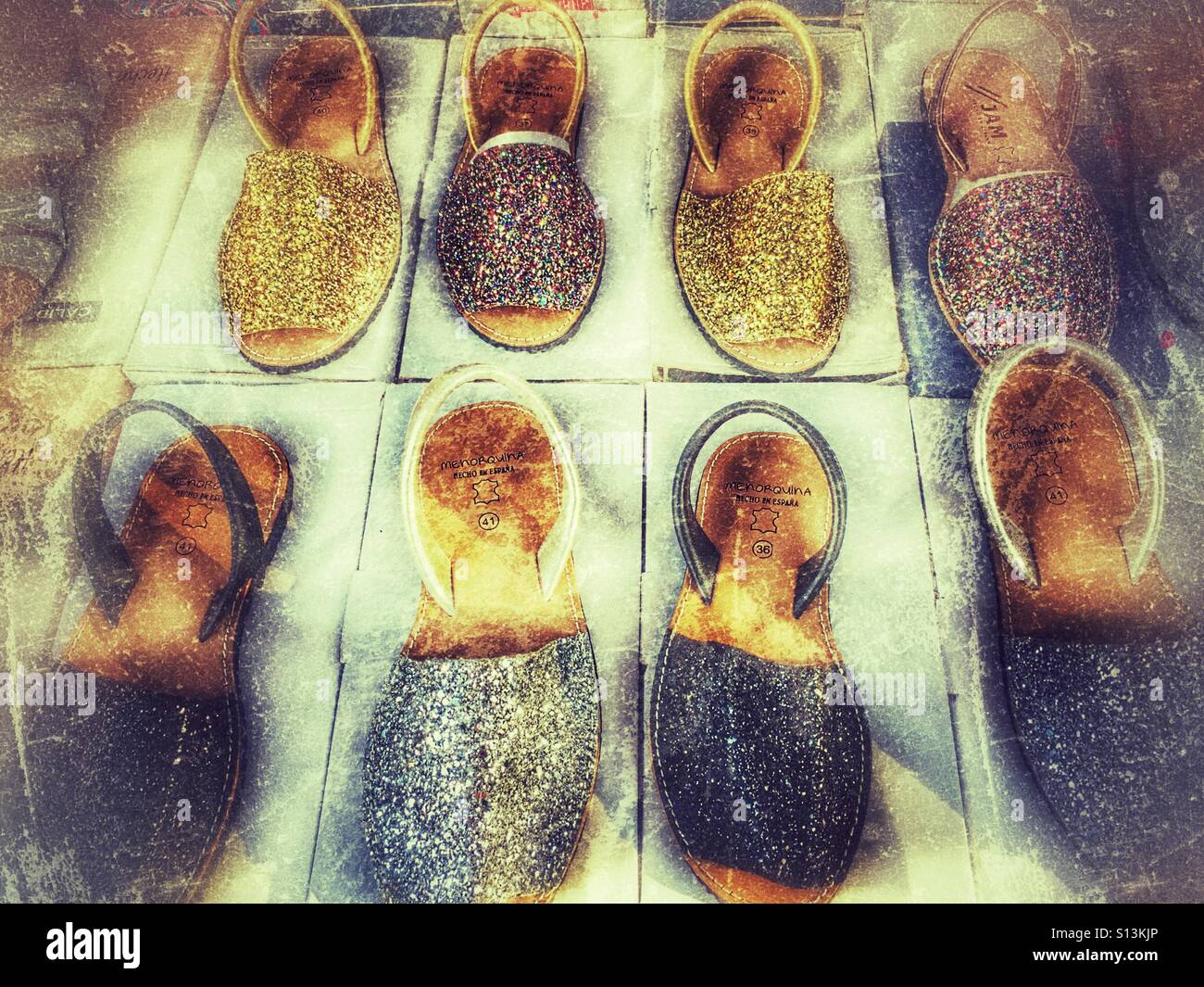 Shoe display on a market stall, Spain - Smartphone Captured Stock Image