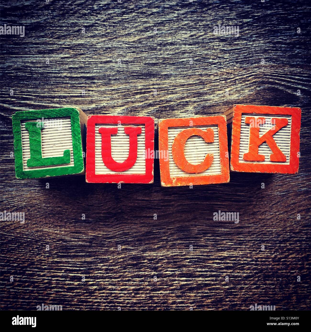 LUCK word written with wood block letter toys - Smartphone Captured Stock Image