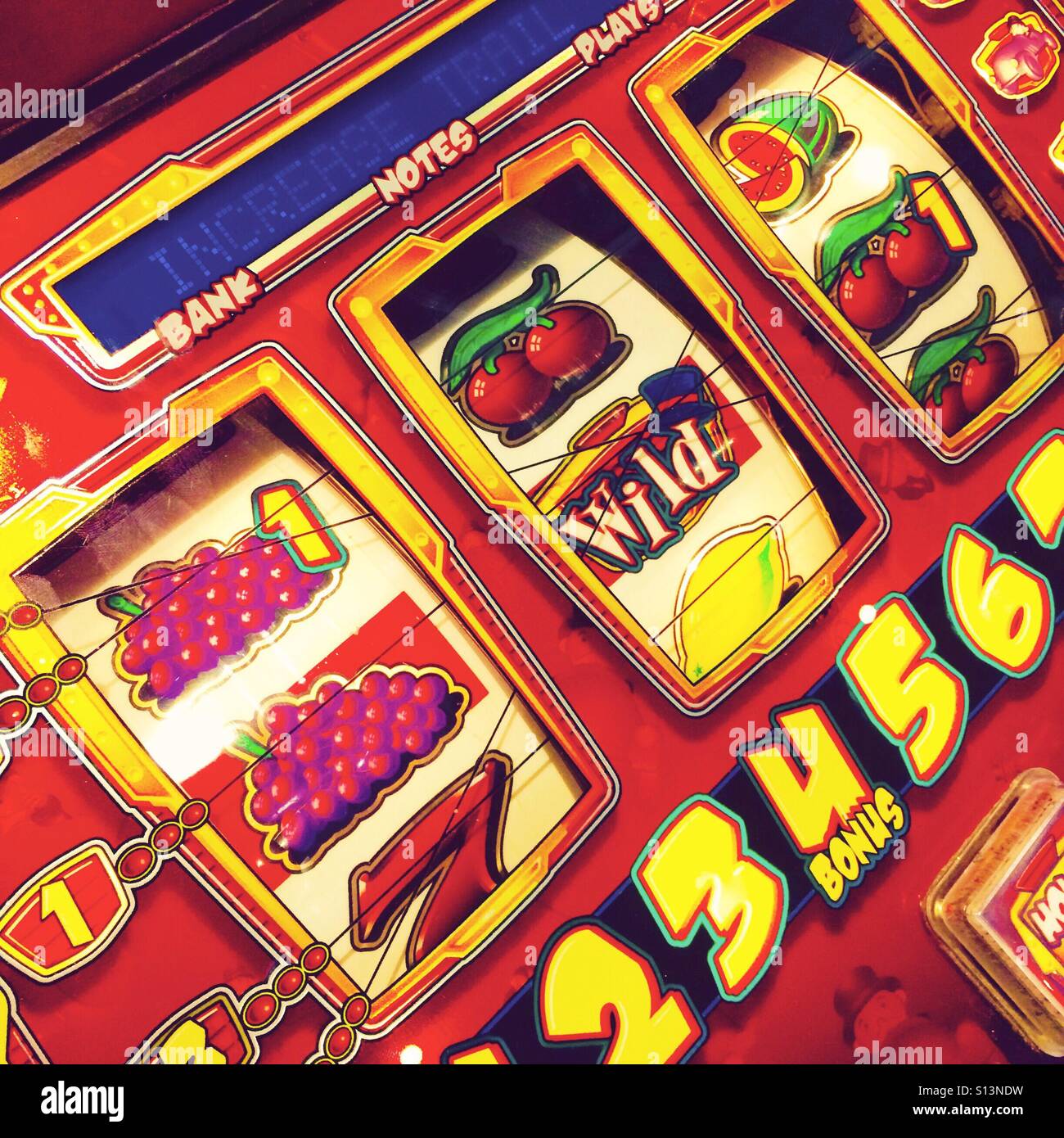 Fruit machine detail in an amusement arcade Stock Photo