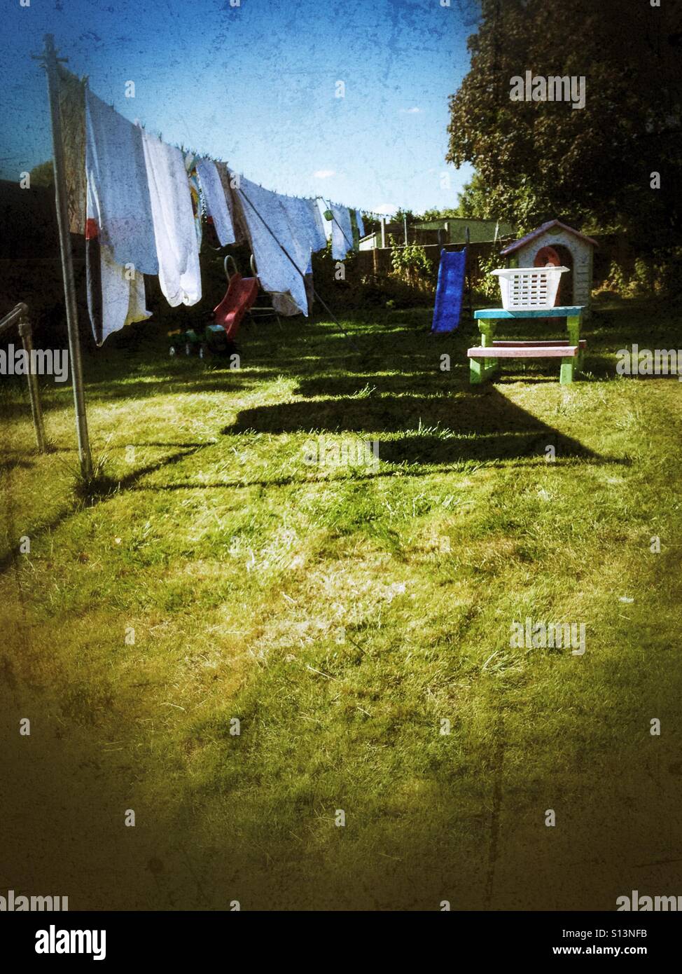 Washing drying on the washing line in the back garden. - Smartphone Captured Stock Image