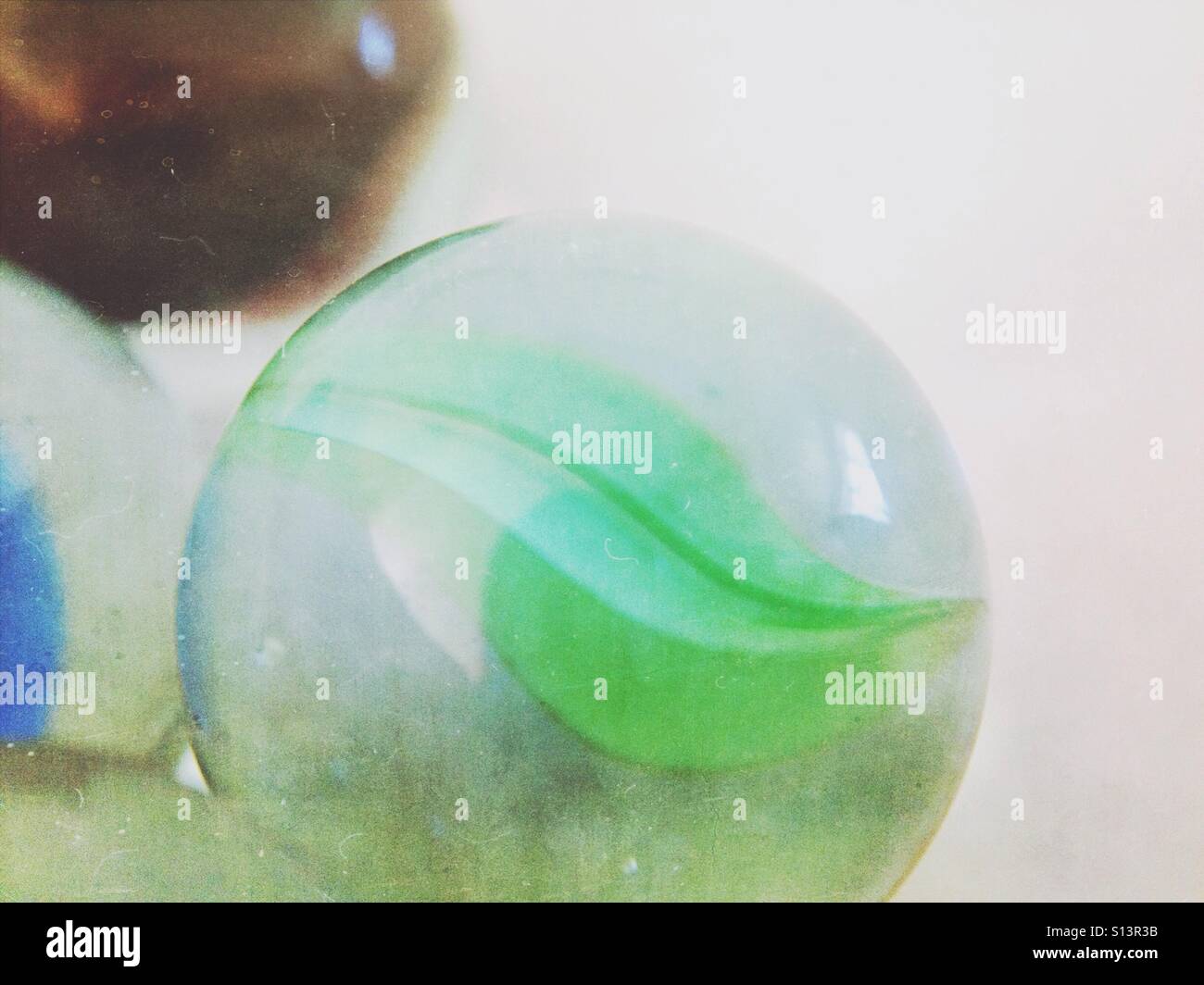 Marbles with overlay Stock Photo - Alamy