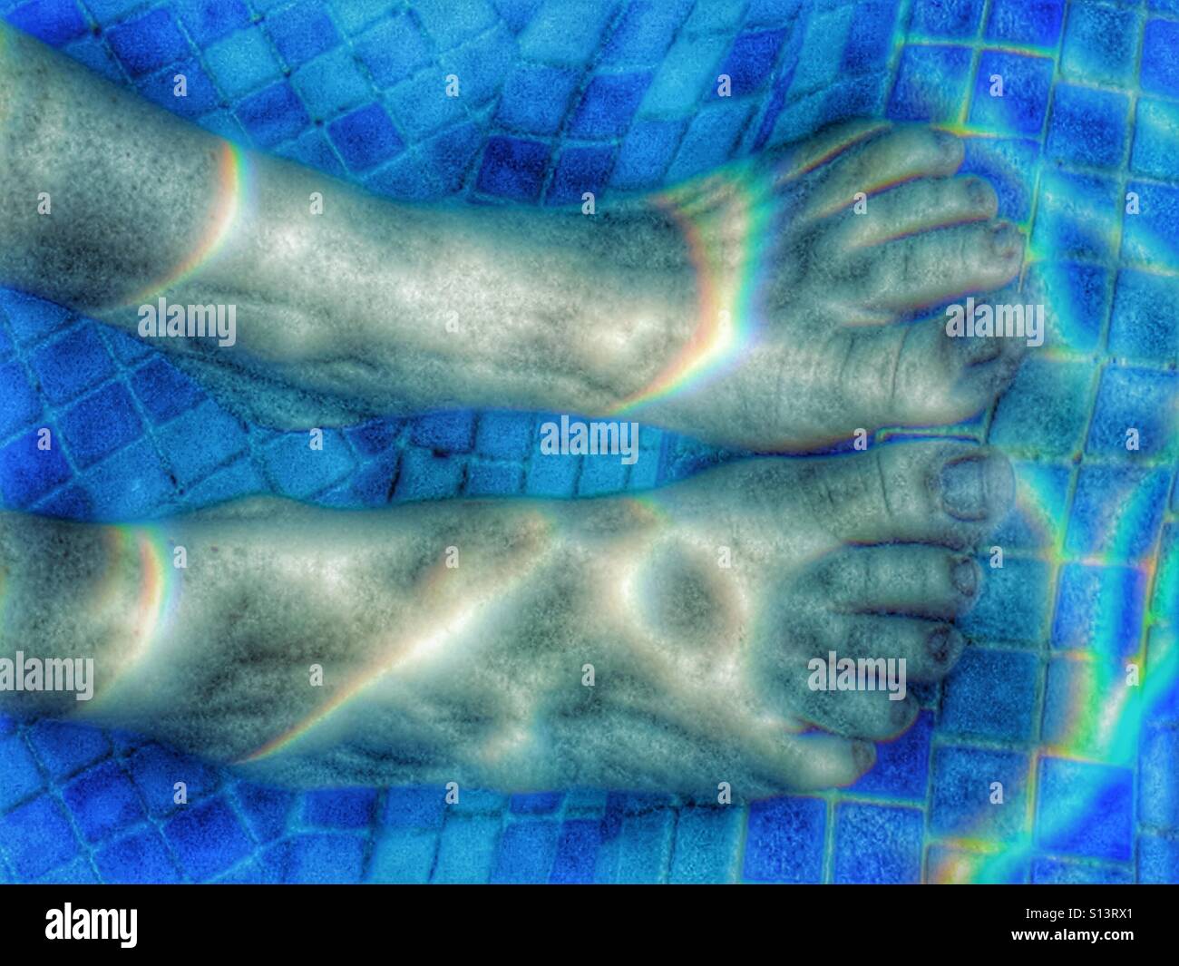Feet, underwater in swimming pool - Smartphone Captured Stock Image