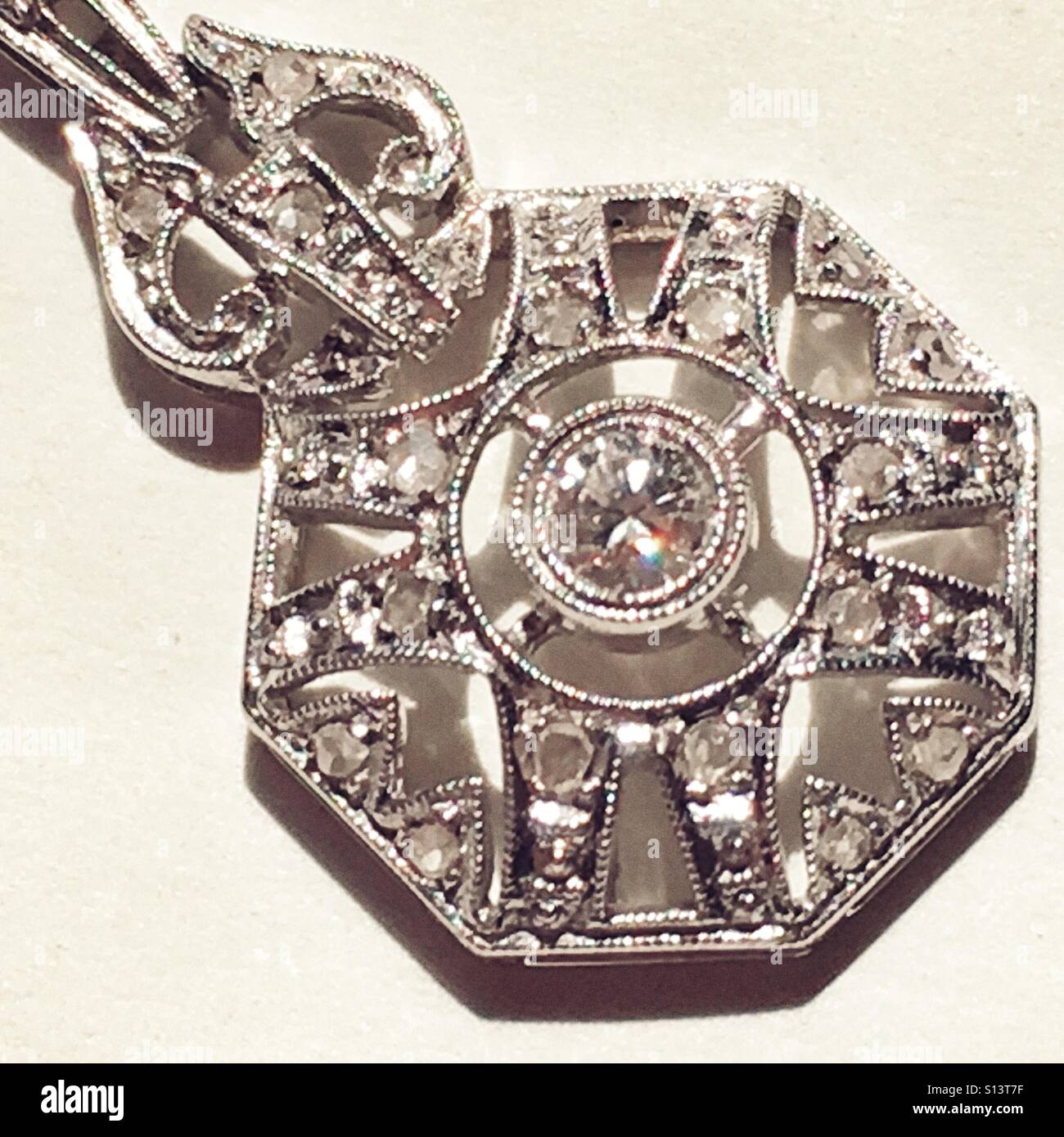 Antique jewellery. Platinum pendant set with diamonds. Detail. - Smartphone Captured Stock Image