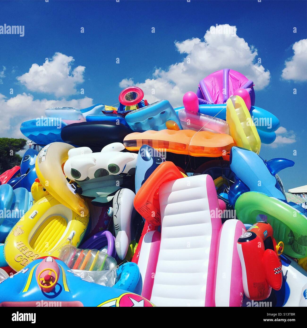 Float rings and boats Stock Photo Alamy